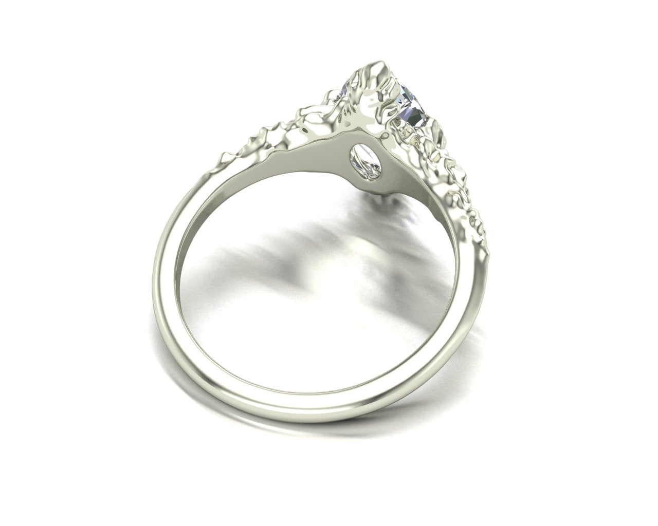 Silver ring with a large diamond on a white background