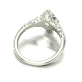 Silver ring with a large diamond on a white background