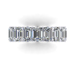 Diamond full eternity ring with emerald-cut stones on a white background