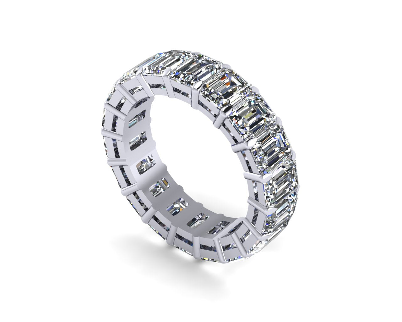 Platinum eternity ring with emerald-cut diamonds on a white background