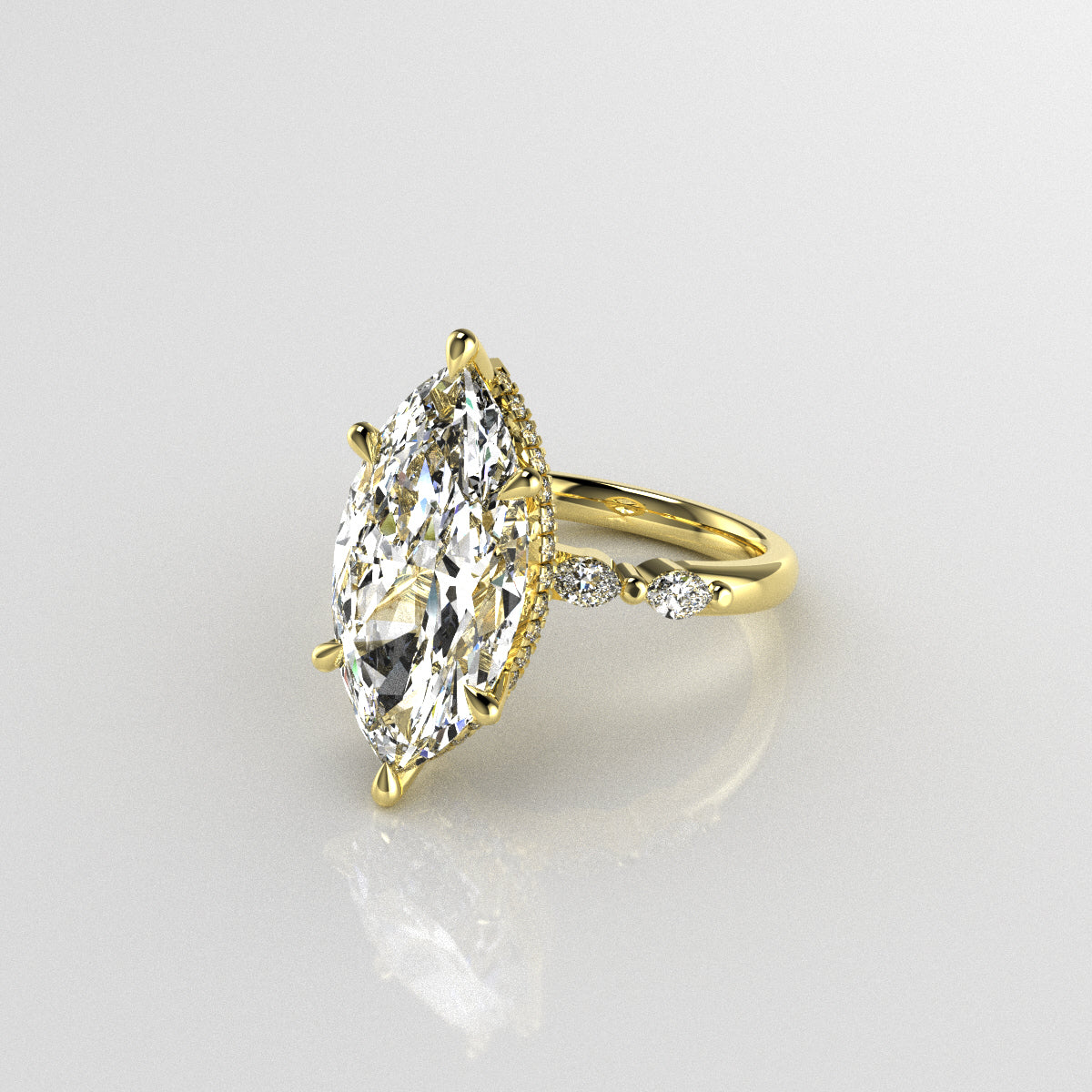 Gold ring with a large marquise-shaped diamond with marquise diamond shoulders band 