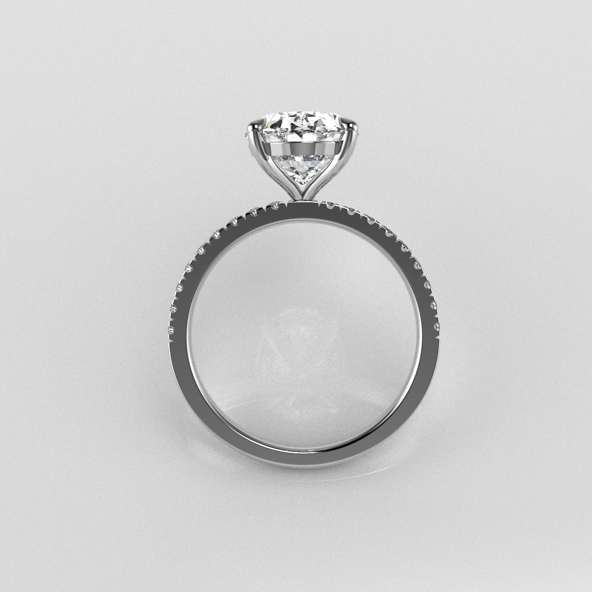 Large Oval Diamond ring with diamond set band with a floating head on a light gray background