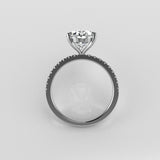 Large Oval Diamond ring with diamond set band with a floating head on a light gray background