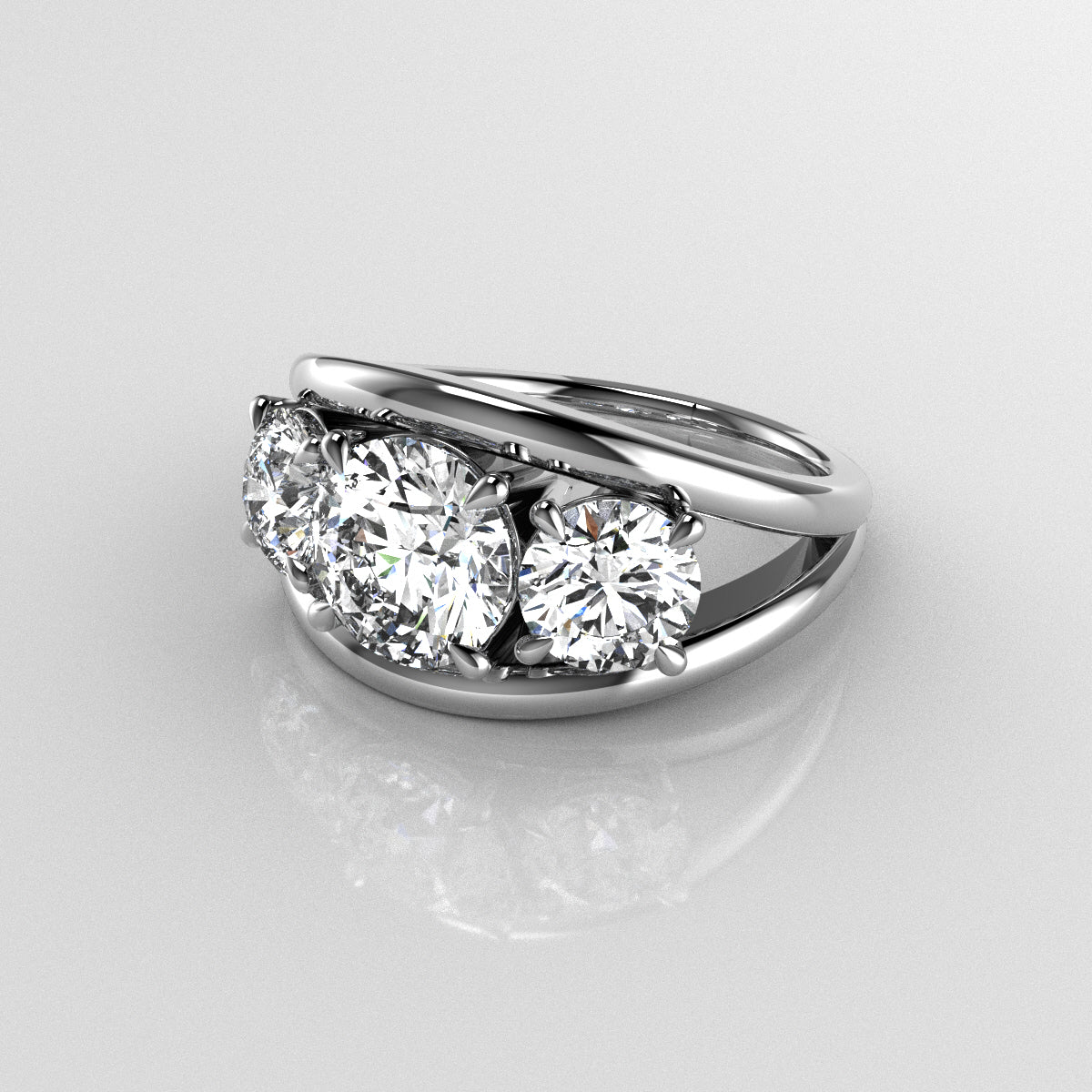 Platinum ring with three round brilliant cut diamonds in prong setting with double bar style ring on a reflective surface