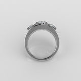 18k white gold three stone round brilliant cut diamond ring on a light gray background