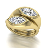 18k yellow gold ring with two large marquise diamonds set in bezel edge on a white background