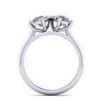 Diamond ring with two pear shaped stones on a white background