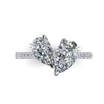 Pair of pear cut diamond on a white gold ring with diamond set pave band 